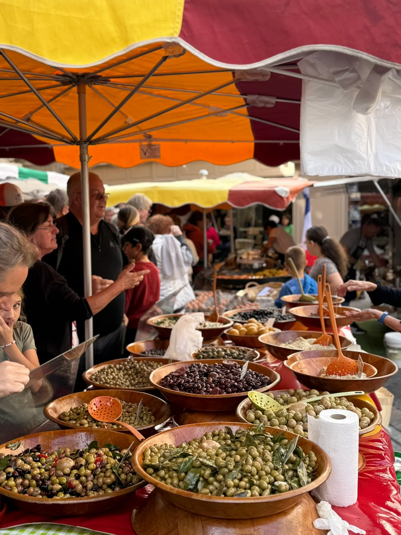 A narrow lane winding through a hilltop village