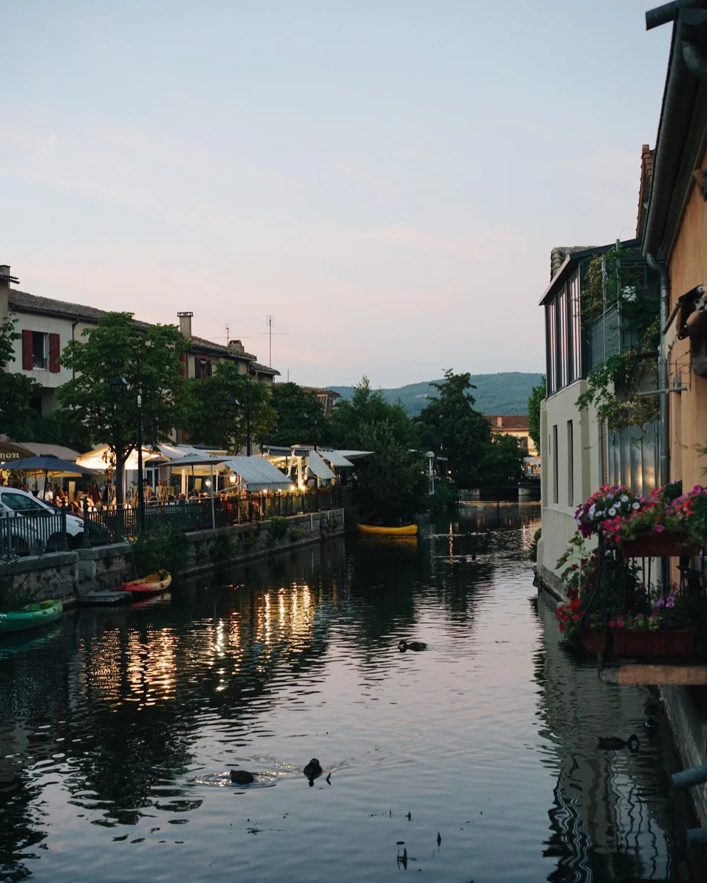 Afternoon shadows across a stone terrace