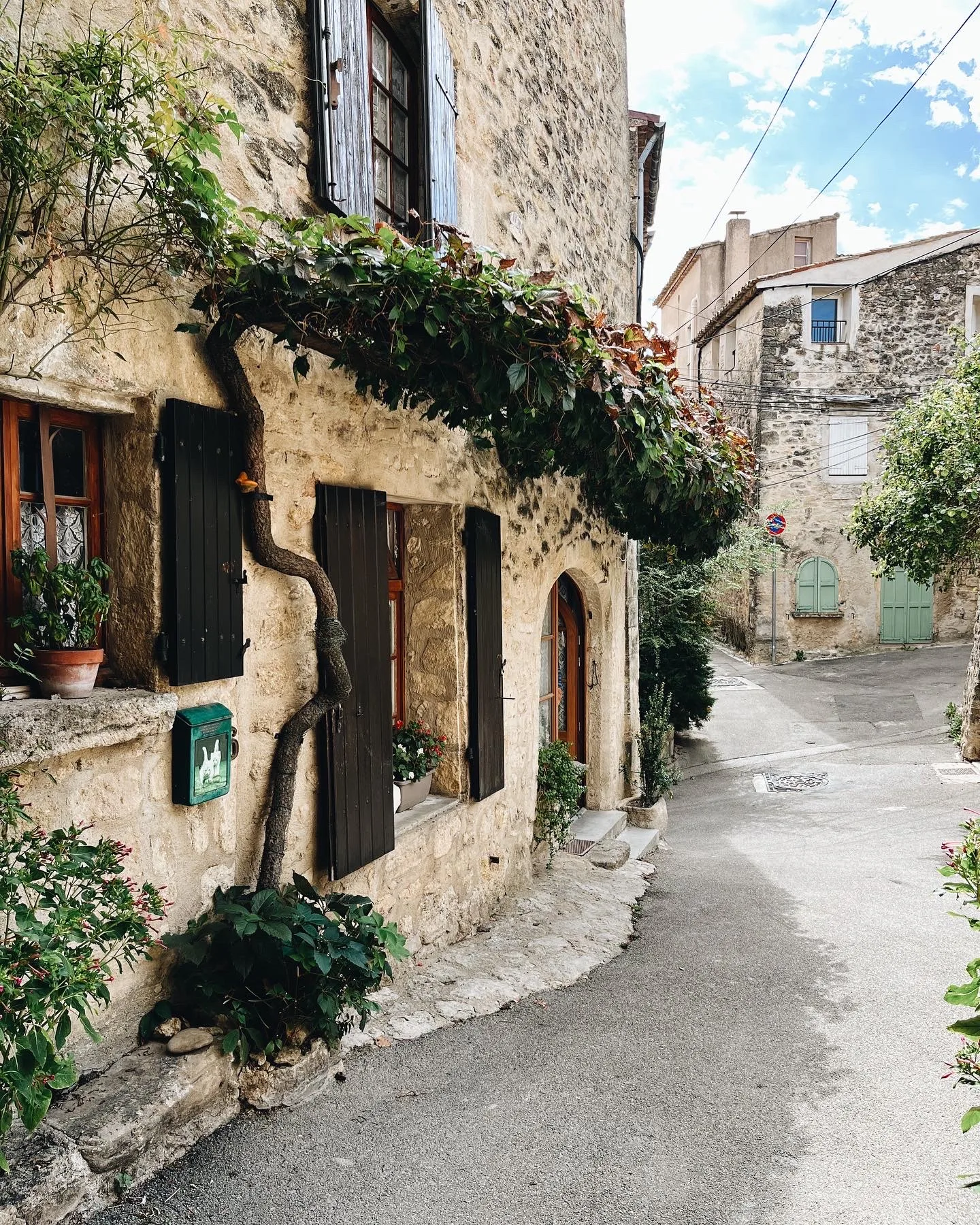 Cobblestone street with shuttered windows